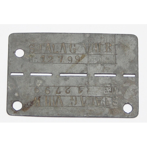 1443 - An unusual WW2 period Stalag VIIIB prisoner of war dog tag, approx 6cm wide