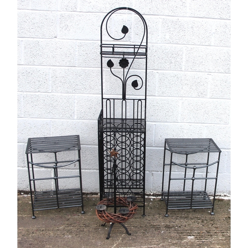 149 - Wrought iron 15 bottle utility wine rack, 2 wrought iron stools and a wrought iron candle holder