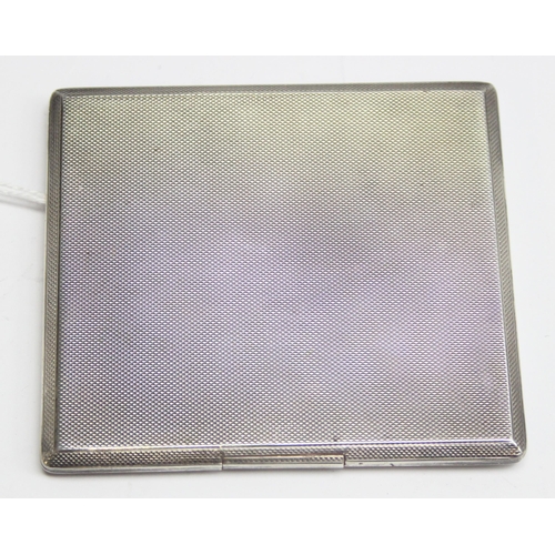 1059 - A heavy Art Deco period silver cigarette case with engine turned decoration & good quality recessed ... 