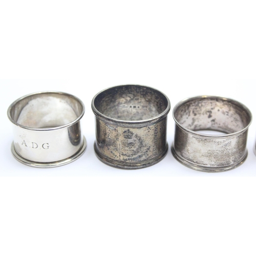 1062 - 5 assorted silver napkin rings, various dates and makers but all with full English hallmarks, one be... 