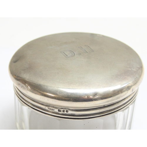 1063 - 2 antique silver topped and cut glass jars, London 1909 Asprey & Co, approx 82.31g gross (without gl... 