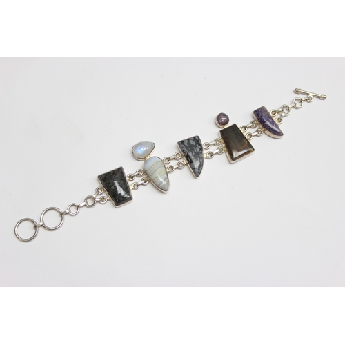 1131 - An unusual silver and polished hardstone bracelet, marked 925 and XRF confirmed, approx 22cm long