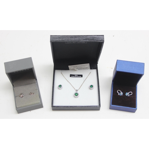 1132 - A boxed silver earring and necklace set and 2 boxed pairs of silver earrings to inc Scottie Dogs