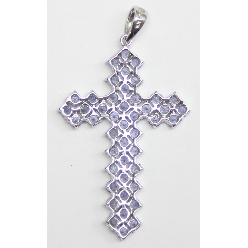 1134 - A 9ct white gold cross pendant set with purple stones, approx 45mm tall, approx 3.73g gross