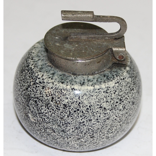 1653 - An early 20th century pottery inkwell formed as a curling stone with metal top, approx 6cm in diamet... 