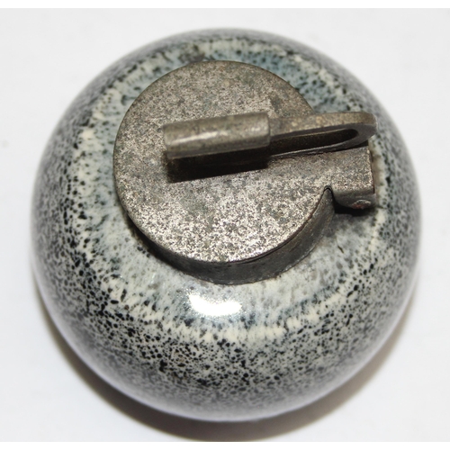 1653 - An early 20th century pottery inkwell formed as a curling stone with metal top, approx 6cm in diamet... 