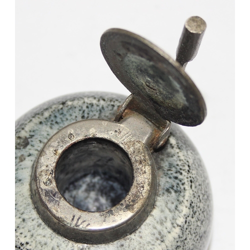 1653 - An early 20th century pottery inkwell formed as a curling stone with metal top, approx 6cm in diamet... 