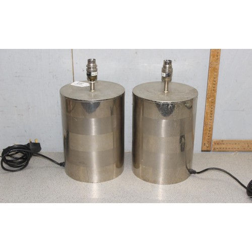 239 - A pair of cylindrical chrome lamp bases, each approx 35cm tall