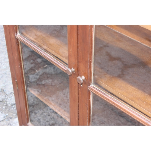 125 - Antique mahogany glass fronted 3 shelved bookcase, approx 100cm W x 35cm D x 128cm H