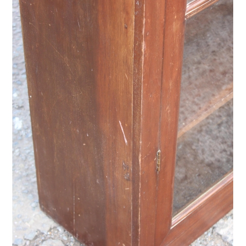 125 - Antique mahogany glass fronted 3 shelved bookcase, approx 100cm W x 35cm D x 128cm H