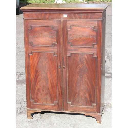 126 - Antique flamed mahogany closed fronted bookcase, approx 95cm W x 41cm D x 135cm H