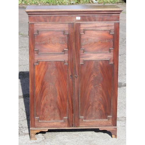 126 - Antique flamed mahogany closed fronted bookcase, approx 95cm W x 41cm D x 135cm H