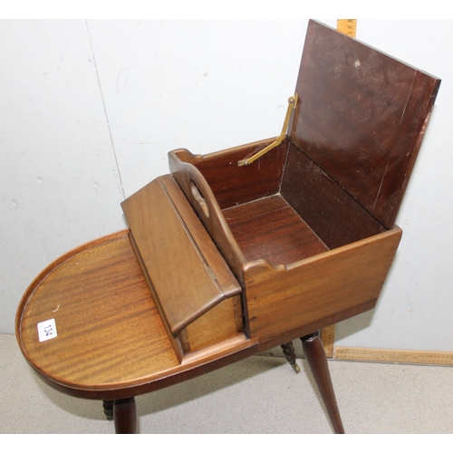 134 - Unusual Regency period mahogany butler's Canterbury or serving table, shaped top with removable box ... 