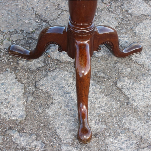 68 - A Georgian tilt top mahogany table with tripod base and pad feet, approx 79cm wide x 79cm deep x 72c... 