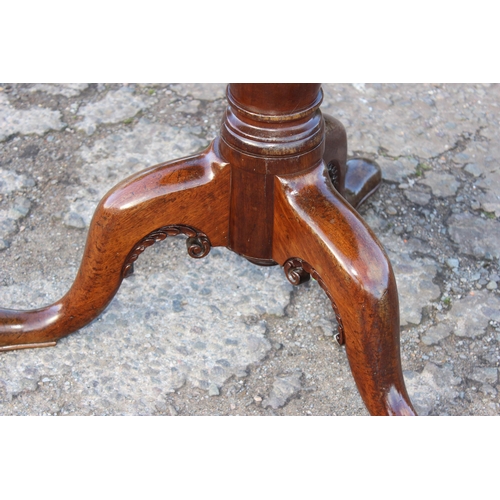 68 - A Georgian tilt top mahogany table with tripod base and pad feet, approx 79cm wide x 79cm deep x 72c... 