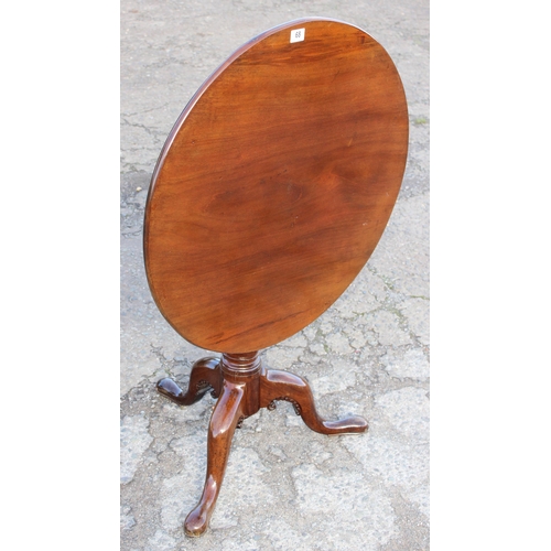 68 - A Georgian tilt top mahogany table with tripod base and pad feet, approx 79cm wide x 79cm deep x 72c... 