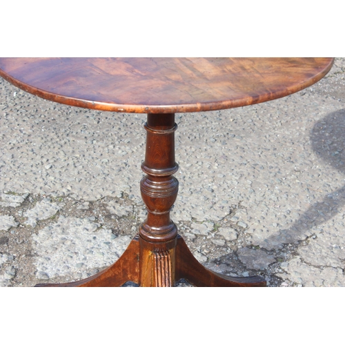 69 - A Georgian tilt top mahogany table with tripod base, approx 62cm wide x 62cm deep x 72cm tall