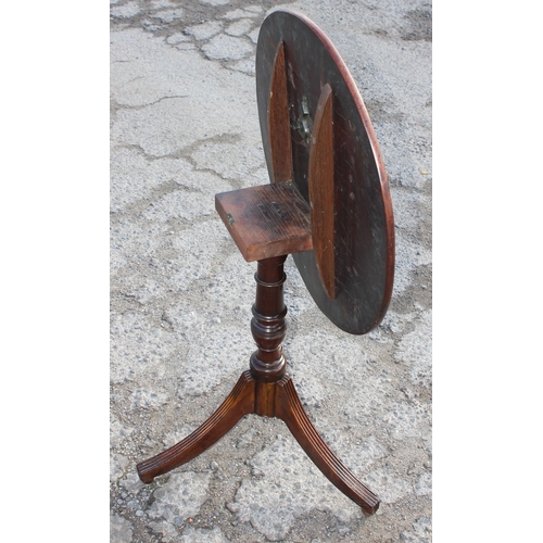 69 - A Georgian tilt top mahogany table with tripod base, approx 62cm wide x 62cm deep x 72cm tall