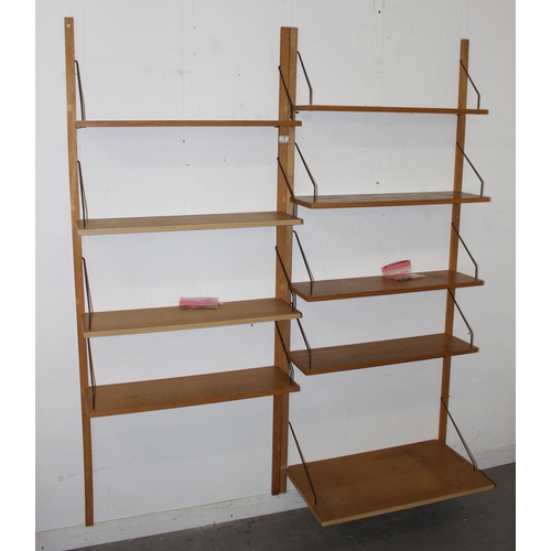 7 - A 1970's Danish Royal System wall unit, designed by Paul Cadovius, comprising 9 shelves and hanging ... 