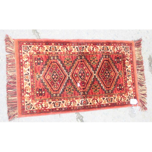 203 - 3 assorted small vintage rugs, the largest approx 110cm x 65cm