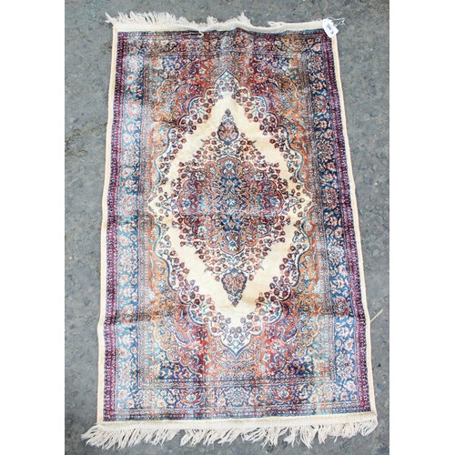 203 - 3 assorted small vintage rugs, the largest approx 110cm x 65cm