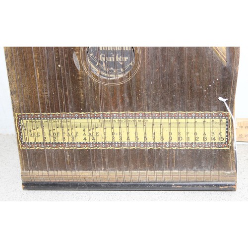 606 - An antique zither harp