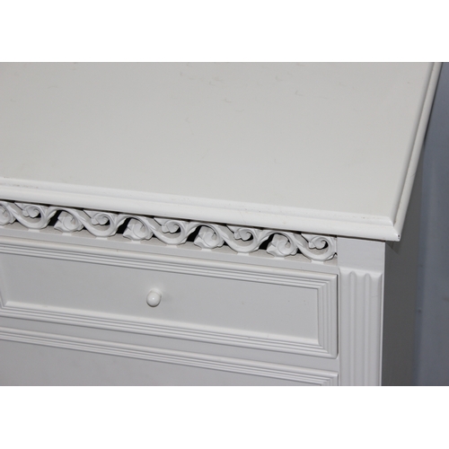 142 - Modern white 2 over 3 chest of drawers with pierced detailing, approx. 90cm W x 36cm D x 76cm H