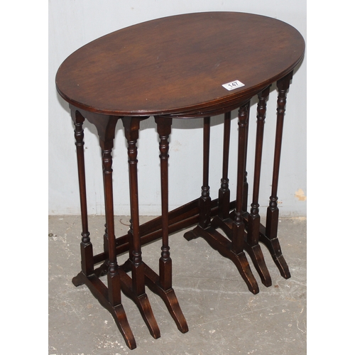 147 - Edwardian oval nest mahogany stacking side tables