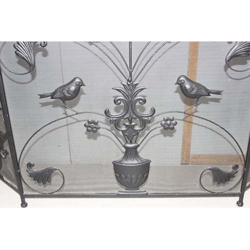 286 - Decorative folding fire place spark guard with bird and floral design approx 130cm x 85cm when opene... 