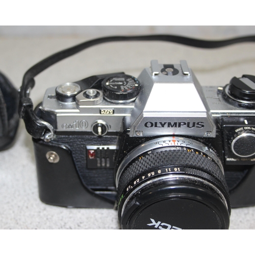 655 - Olympus OM-10 camera with 1:1.8 f=50mm lens, with case