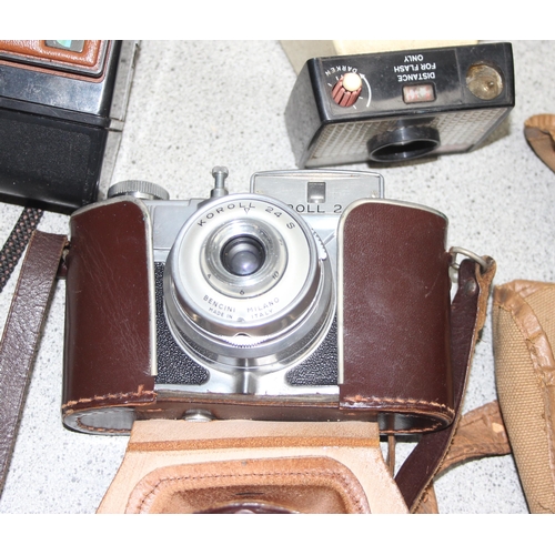 659 - Qty of assorted vintage cameras and lenses to inc a Pentax S1A & a Bower Super Tele 3x52mm etc