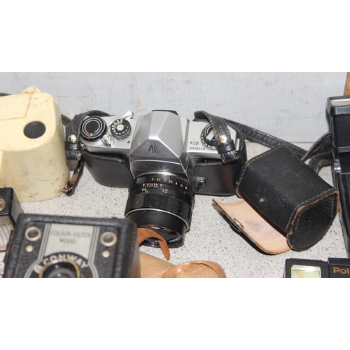 659 - Qty of assorted vintage cameras and lenses to inc a Pentax S1A & a Bower Super Tele 3x52mm etc