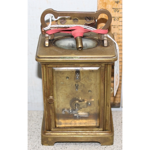 1319 - A vintage brass cased carriage clock with enamel dial and French mechanical movement