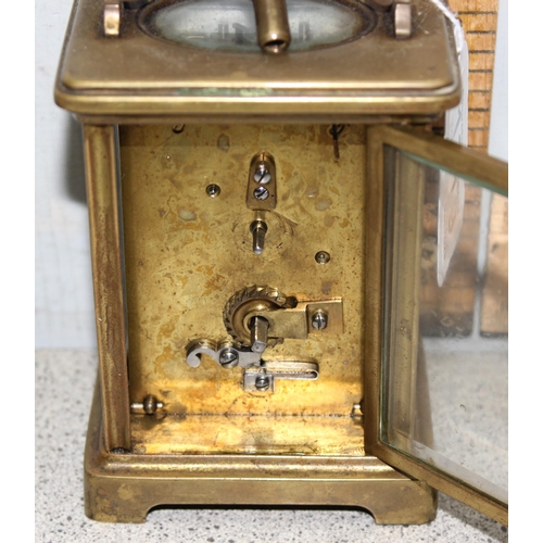 1319 - A vintage brass cased carriage clock with enamel dial and French mechanical movement