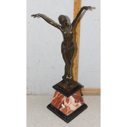 1631 - In the manner of Demitri Chiparus, an Art Deco style bronze figure formed as a dancing lady on marbl... 