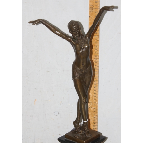 1631 - In the manner of Demitri Chiparus, an Art Deco style bronze figure formed as a dancing lady on marbl... 