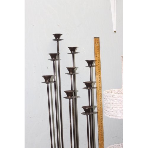 285 - 9 branch modernist floor standing tea light stand and a 3 tier floor standing basket