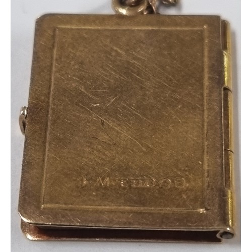 1108 - 9ct gold locket pendant formed as a book, on 9ct gold chain, London 1957, chain approx 38cm long, ap... 