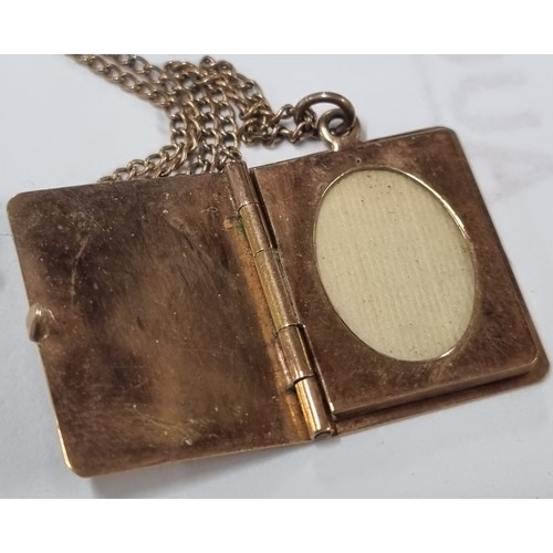 1108 - 9ct gold locket pendant formed as a book, on 9ct gold chain, London 1957, chain approx 38cm long, ap... 