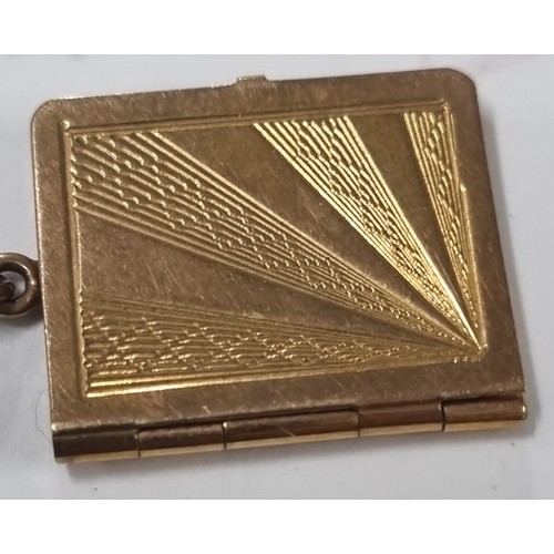 1108 - 9ct gold locket pendant formed as a book, on 9ct gold chain, London 1957, chain approx 38cm long, ap... 