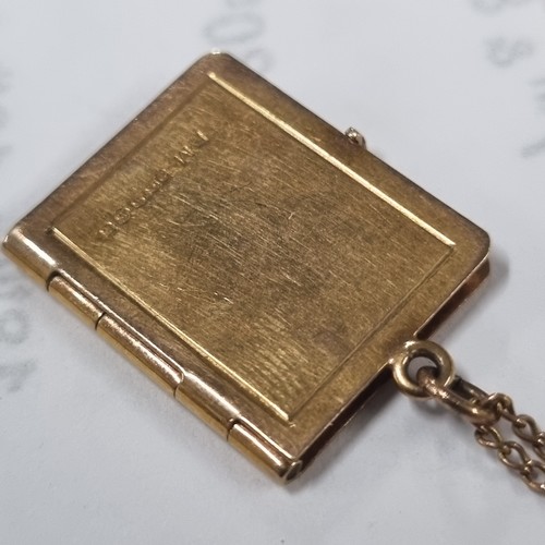 1108 - 9ct gold locket pendant formed as a book, on 9ct gold chain, London 1957, chain approx 38cm long, ap... 