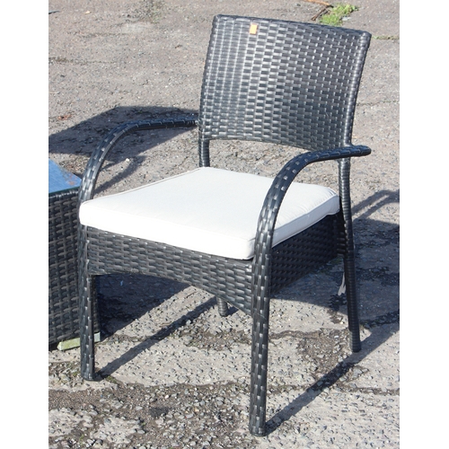 300 - Rattan garden seat set comprising 2 arm chairs and glass-topped cube table (50cm x 50cm x 45cm)