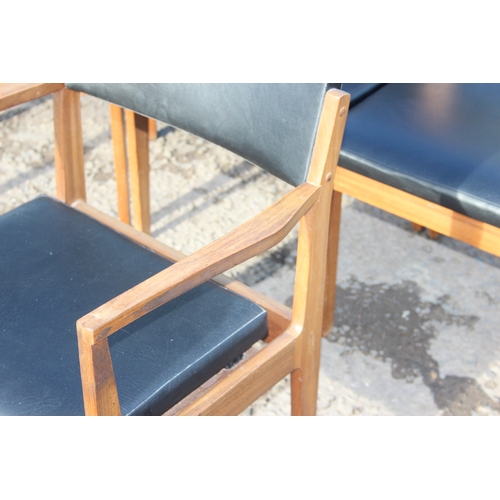 8 - 5 retro Danish style mid-century teak chairs to incl 1 carver, with black vinyl upholstery, possibly... 