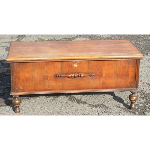 11 - A vintage American made storage box raised on turned legs by Lane Altavista VA, approx 113cm W x 50c... 