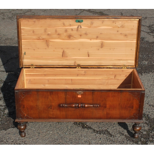 11 - A vintage American made storage box raised on turned legs by Lane Altavista VA, approx 113cm W x 50c... 