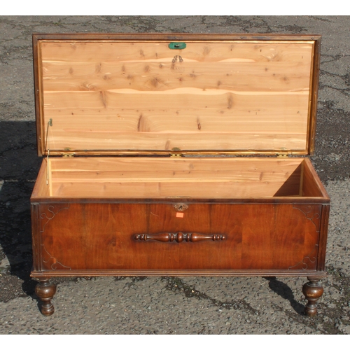 11 - A vintage American made storage box raised on turned legs by Lane Altavista VA, approx 113cm W x 50c... 