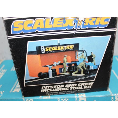 1508 - 2 boxes of Scalextric track, buildings and cars