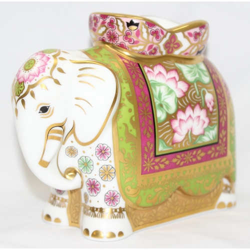 1640 - Royal Crown Derby 'Mother Indian Elephant' with gold, pink and green decoration, approx 11.5cm tall