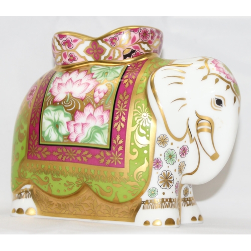 1640 - Royal Crown Derby 'Mother Indian Elephant' with gold, pink and green decoration, approx 11.5cm tall