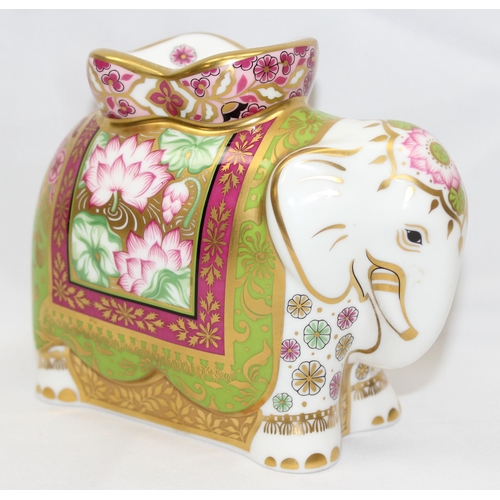 1640 - Royal Crown Derby 'Mother Indian Elephant' with gold, pink and green decoration, approx 11.5cm tall